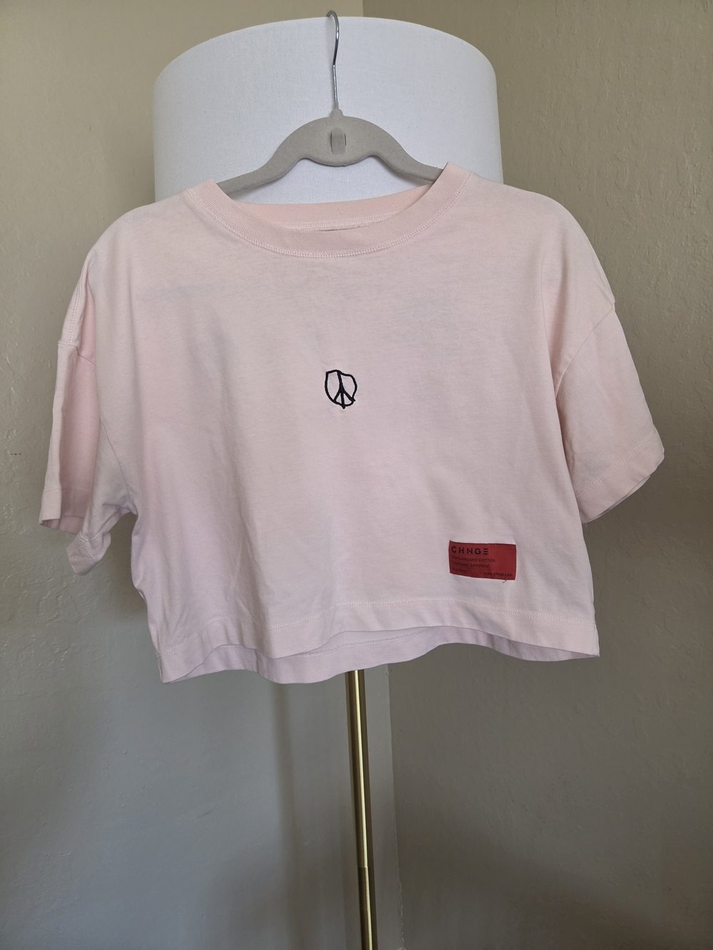 CHNGE 100% Organic Cotton  Pale Pink Cropped Tee with Embroidered Peace Logo